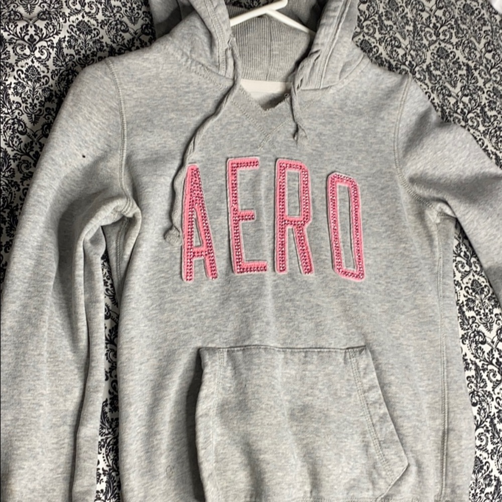 Grey sweater.